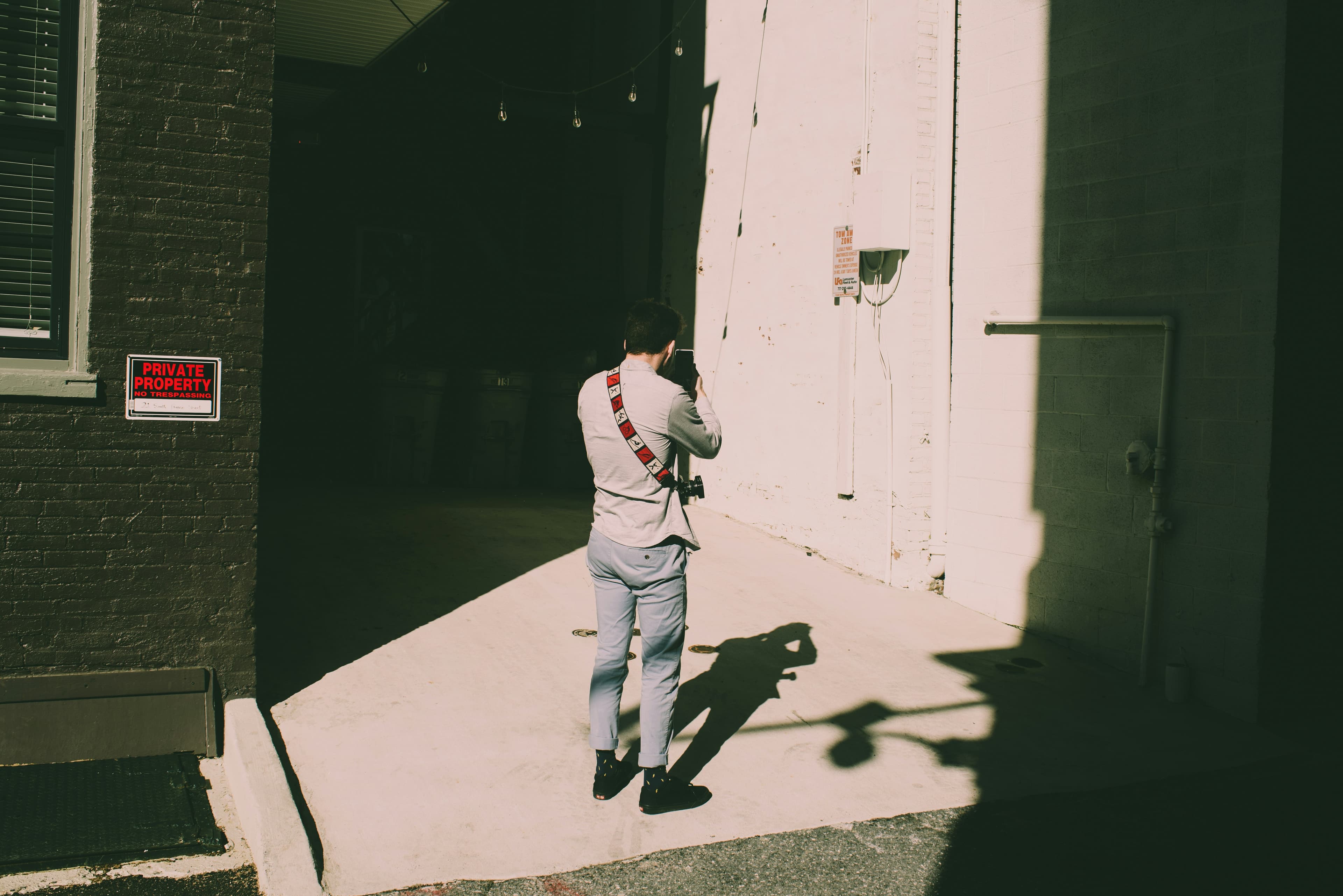 An inspector documenting property conditions on-site